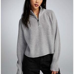 Zipped collared ribbed sweater